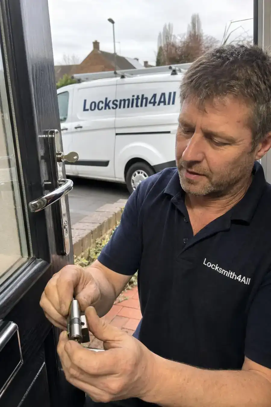 Professional Locksmith4All engineer fitting a lock in Your Area